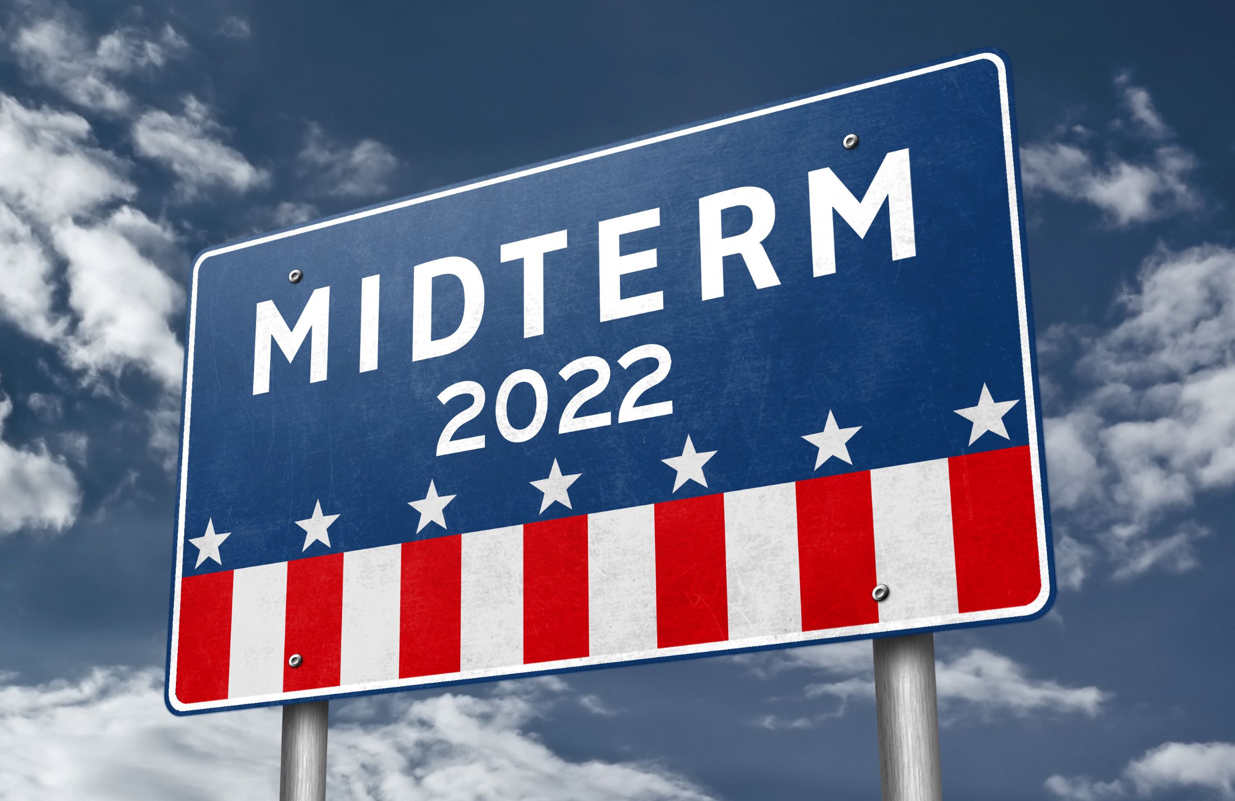 Street sign that reads Midterm 2022 on a background of stars and stripes like the American flag