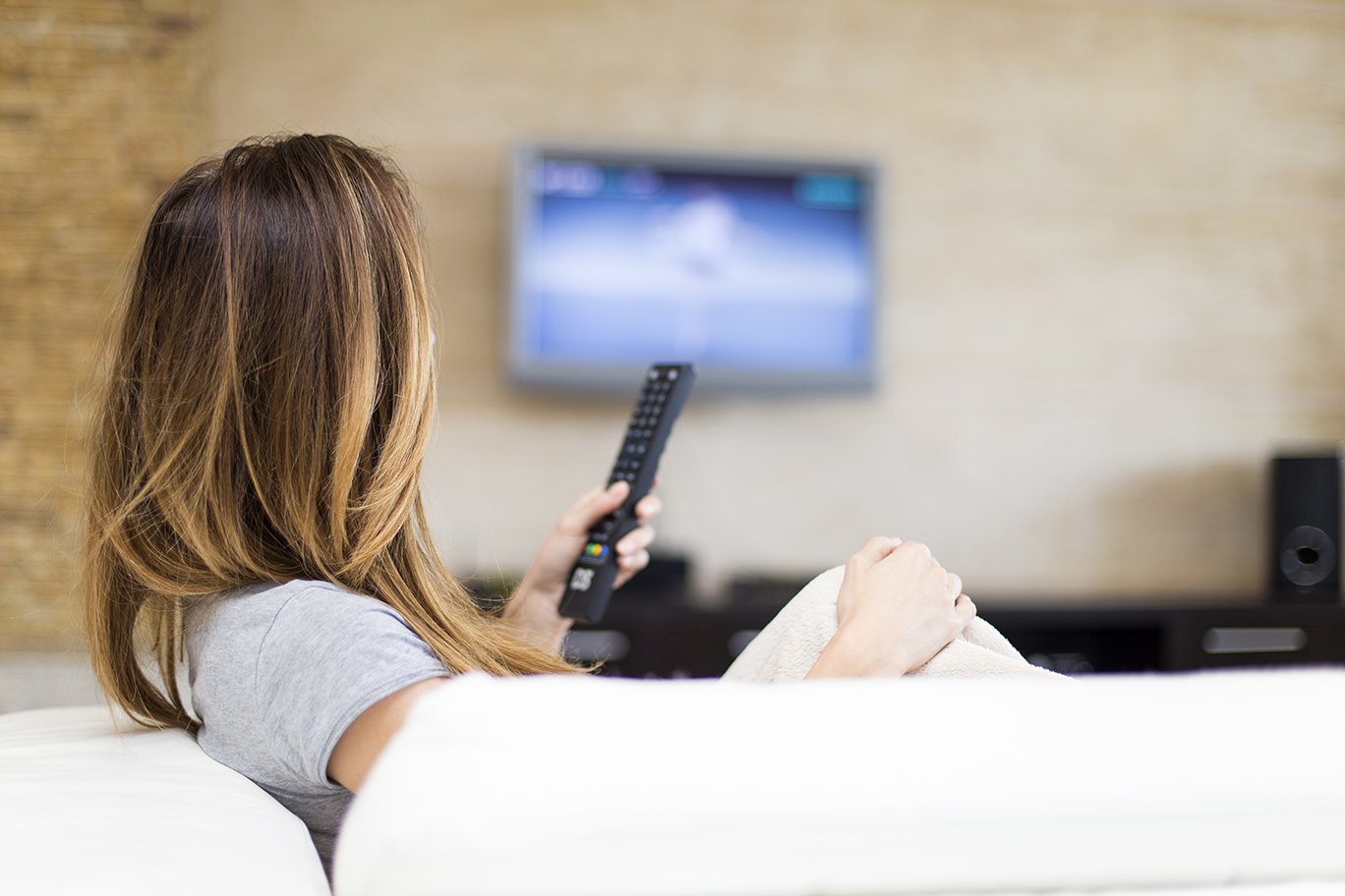 woman watching a smart TV
