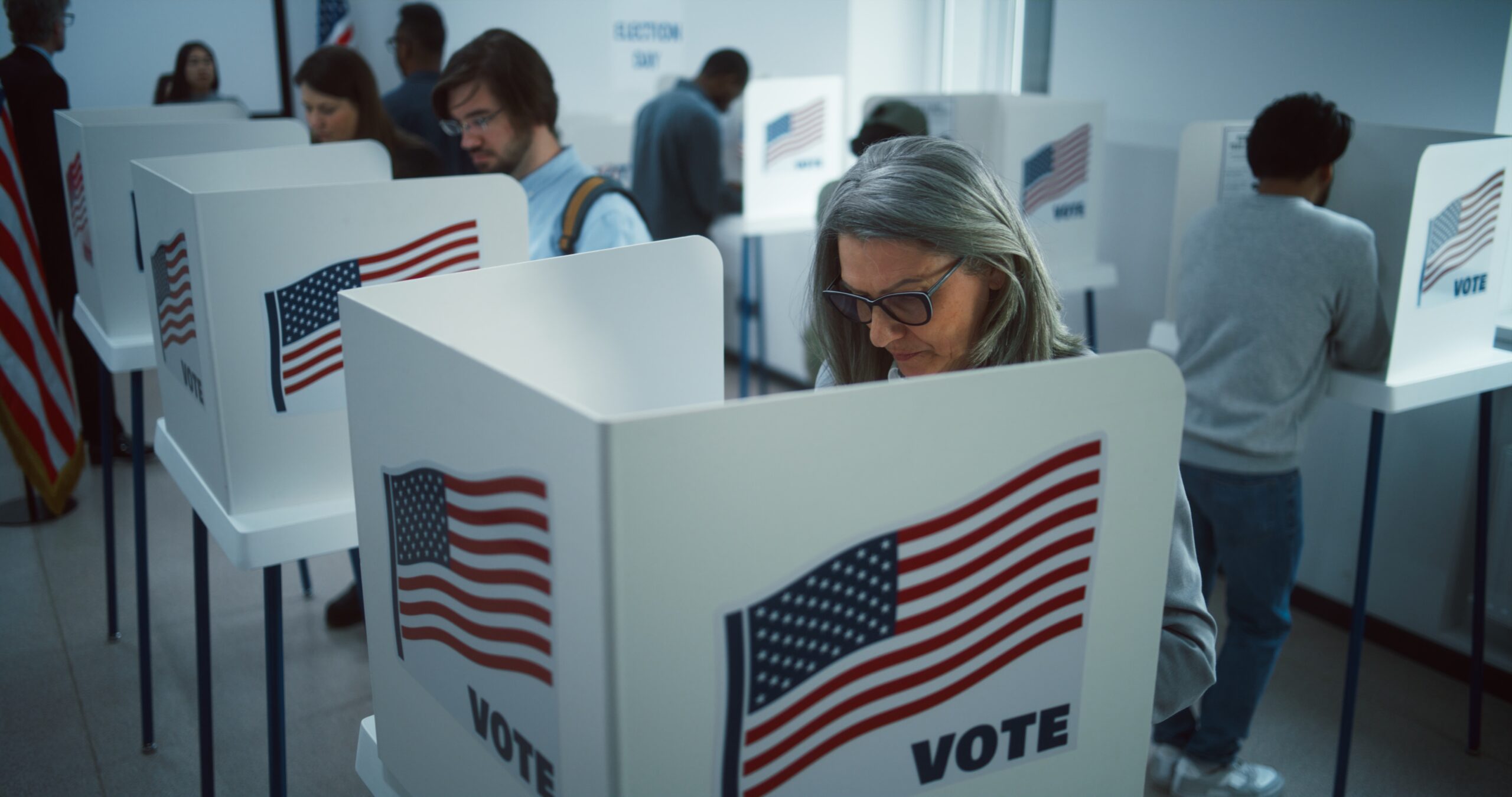 Woman in a voting booth